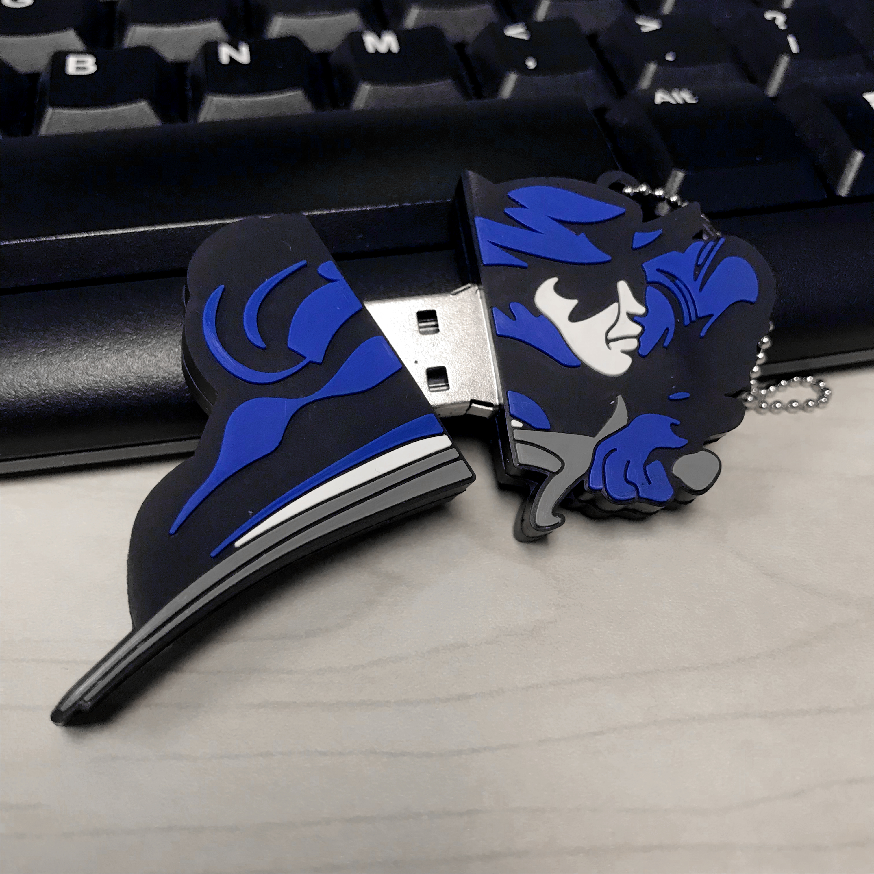 A flashdrive in the shape of the Lindsey Wilson college mascot.