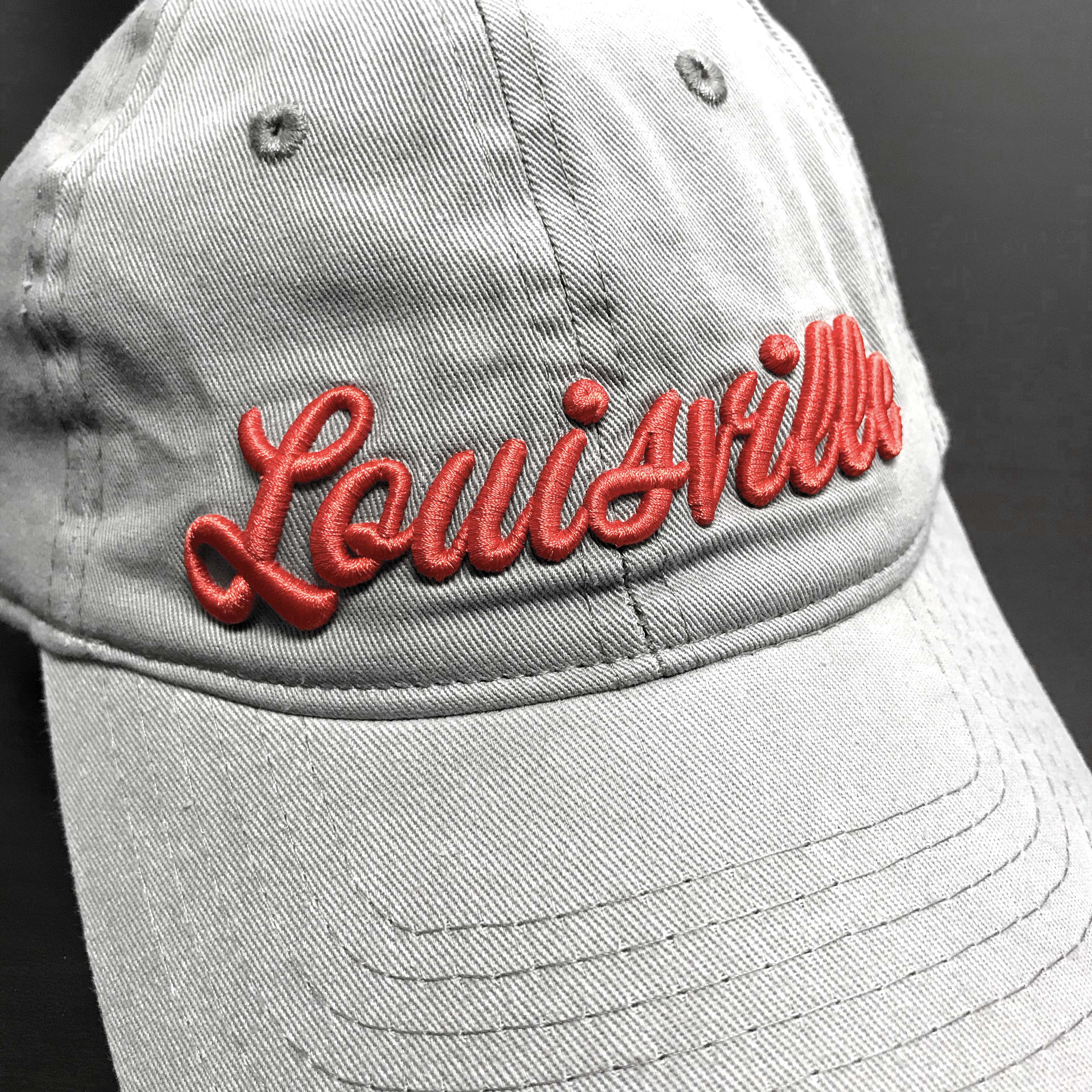 Louisville embroidered gray baseball hat.